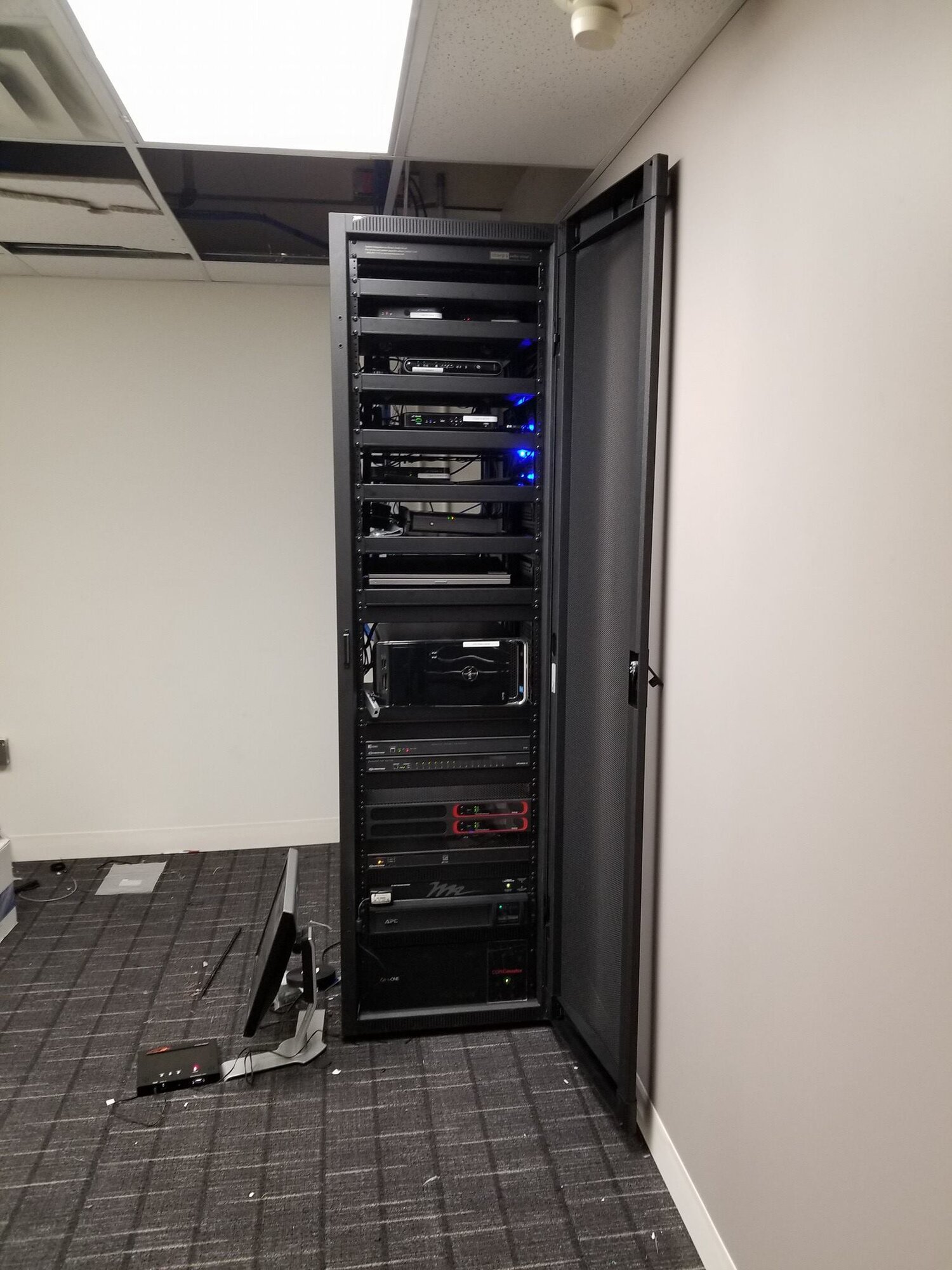 Full-height AV and network rack