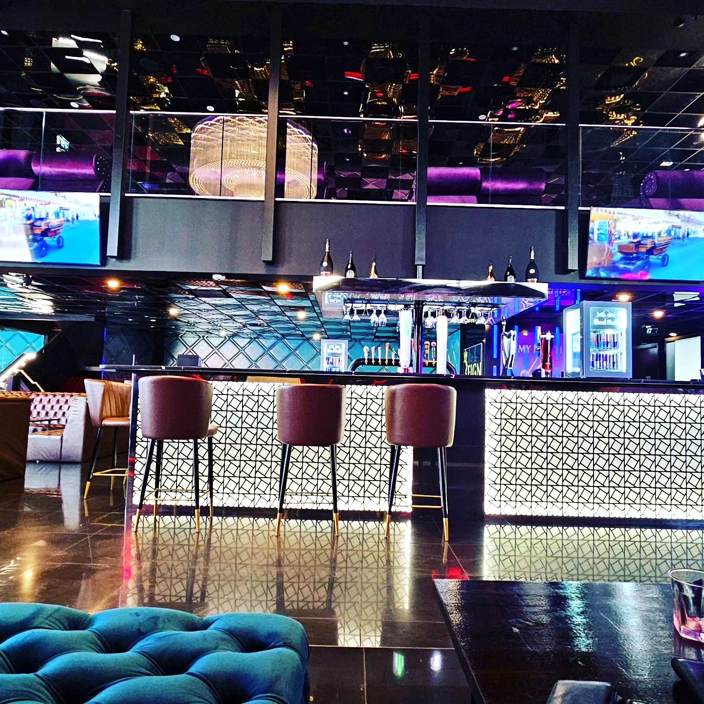 Nightclub bar with TVs