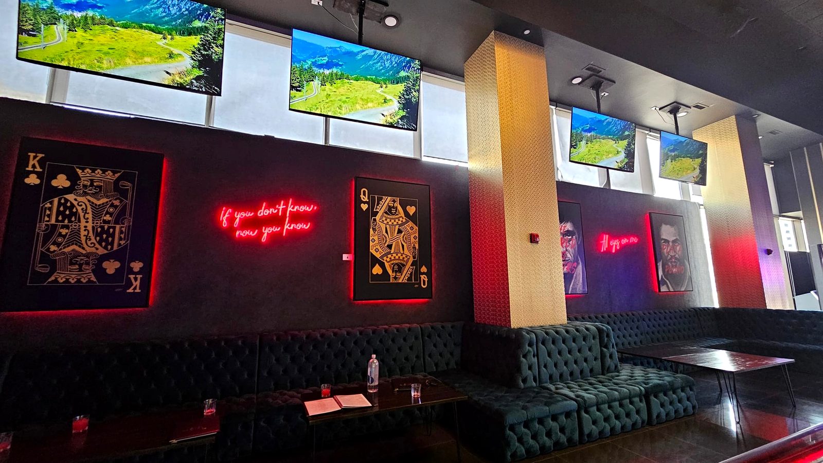 Lounge with mounted TVs