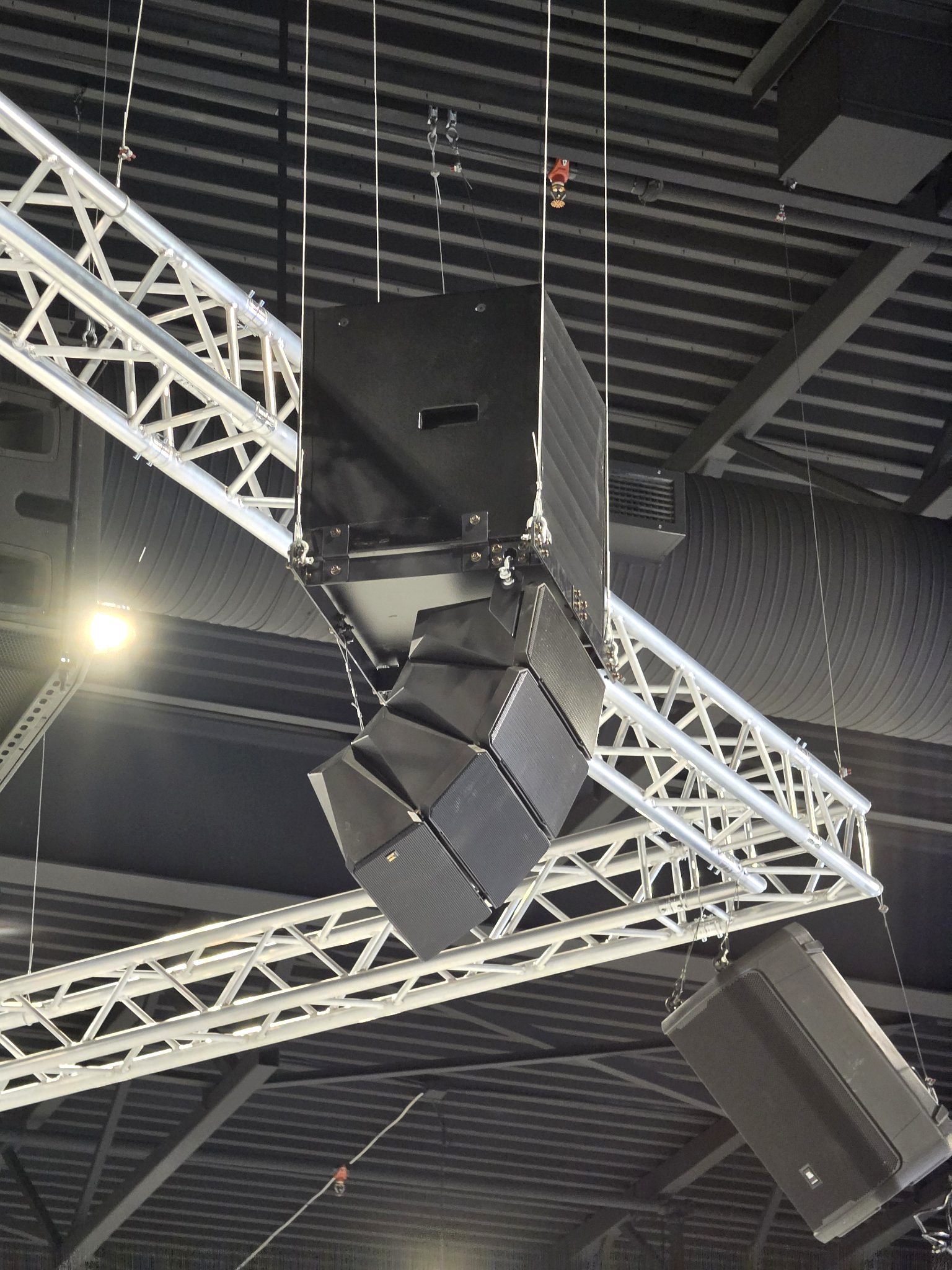 Truss speaker system over gym floor